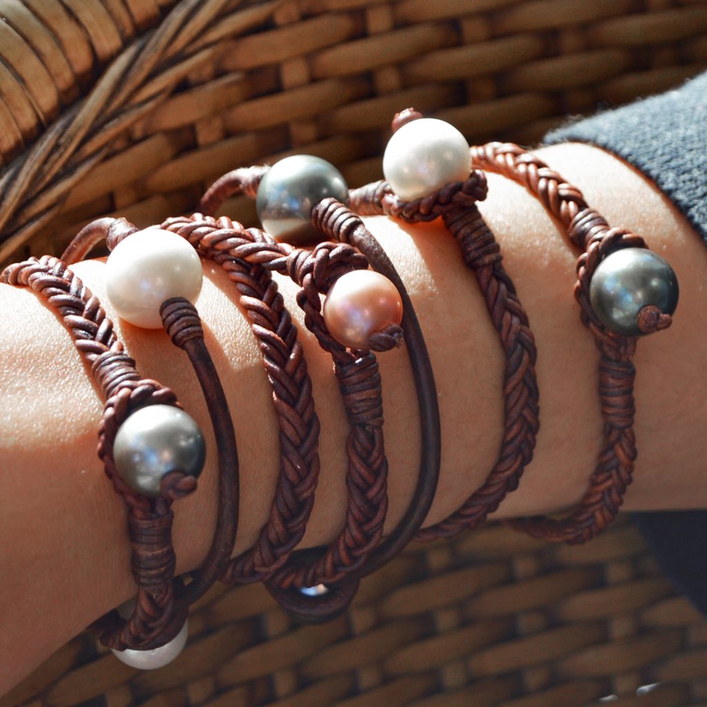 Collection of Vincent Peach bracelets featuring leather and braided leather with freshwater or tahitian pearls
