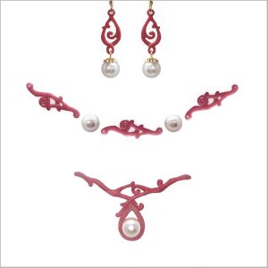 Hand-carved wax models for lost wax casting process. Pearl and scroll branch style pieces for earrings, necklace and bracelet, commissioned ordered as a custom jewelry set for a bride to wear on her wedding day,