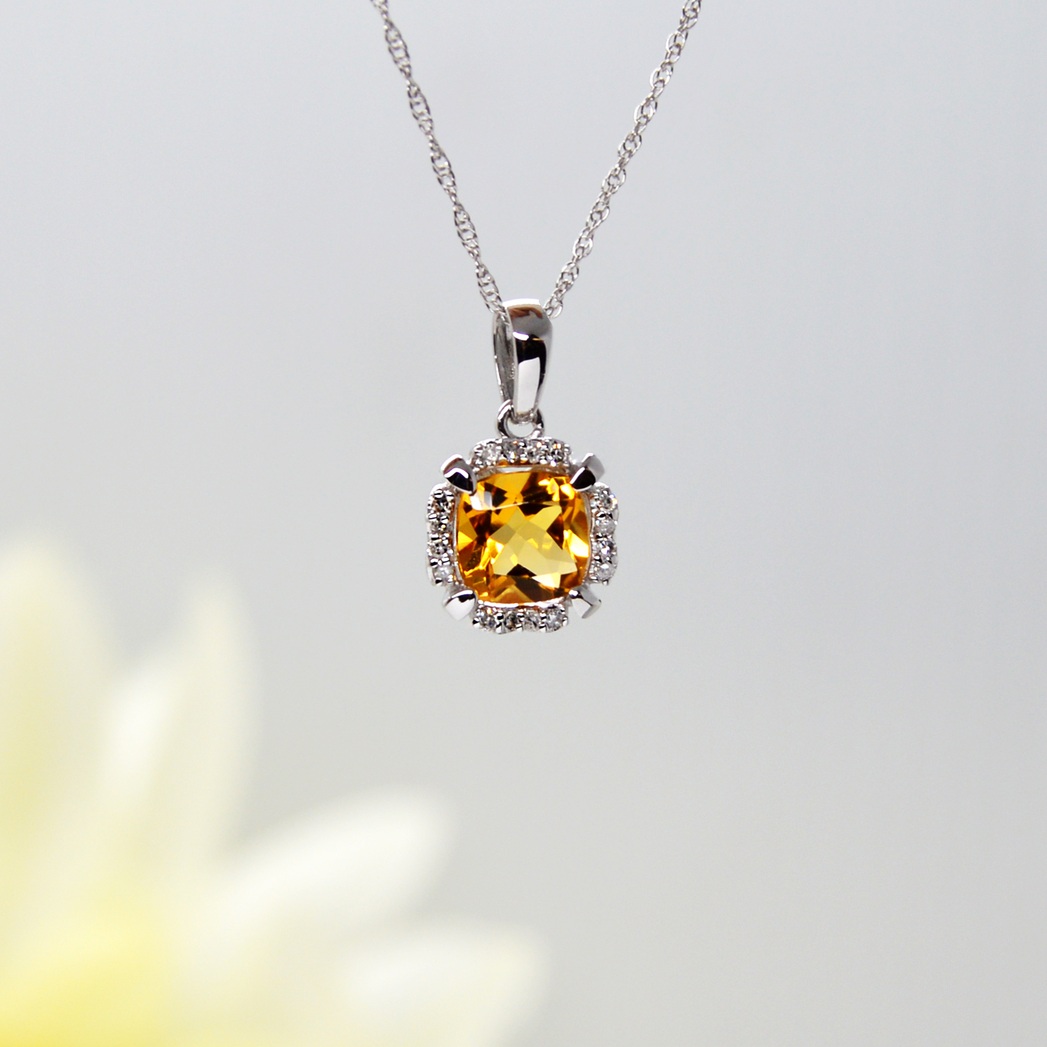 Citrine and diamond halo cushion cut pendant in 14k white gold