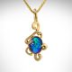 Swirl design custom pendant designed by Morgan's Treasure Custom Jewelry in Westerville, OH with oval black opal blue and green cabochon gemstone in 14k yellow gold