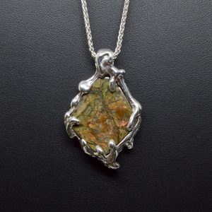 Ammolite necklace in sterling silver with flame design, made by Morgan's Treasure