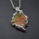 Ammolite necklace in sterling silver with flame design, made by Morgan's Treasure