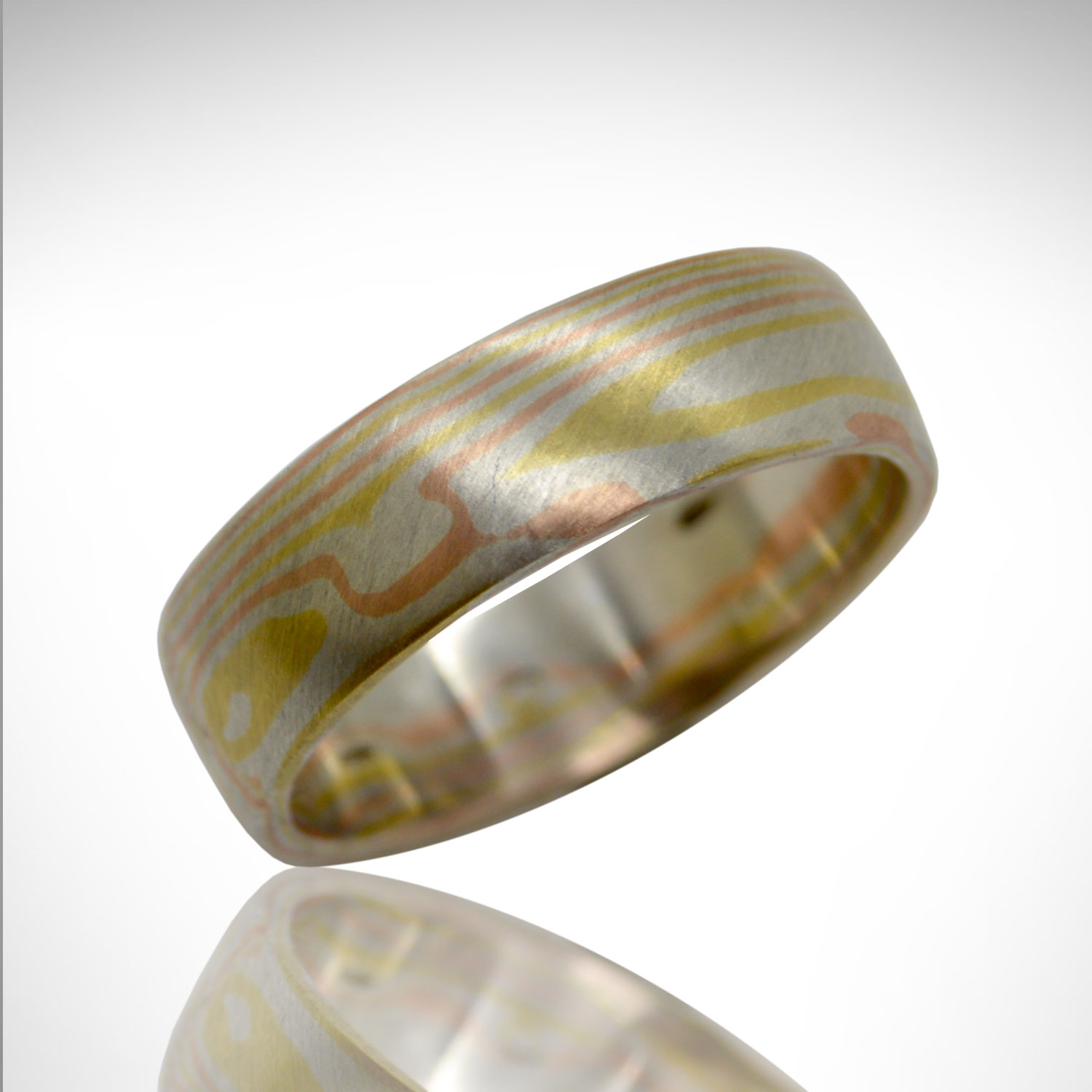 Mokume Gane Ring in 18Kt Yellow, 14Kt Palladium White Gold and Sterling Silver, hand fabricated designed by Morgan's Treasure