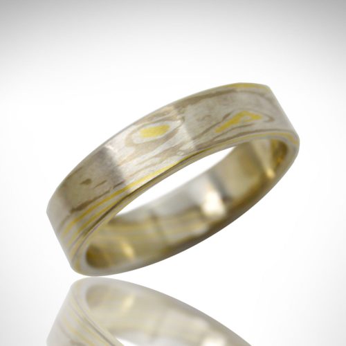 Custom made mokume gane wedding band with 18k yellow gold, 14k white gold and sterling silver, designed by Morgan's Treasure