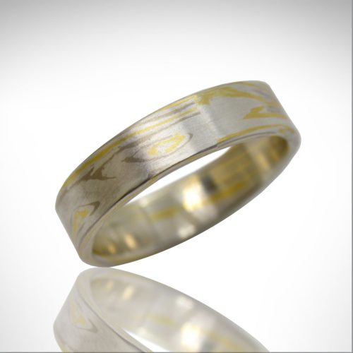 Custom made mokume gane wedding band with 18k yellow gold, 14k white gold and sterling silver, designed by Morgan's Treasure