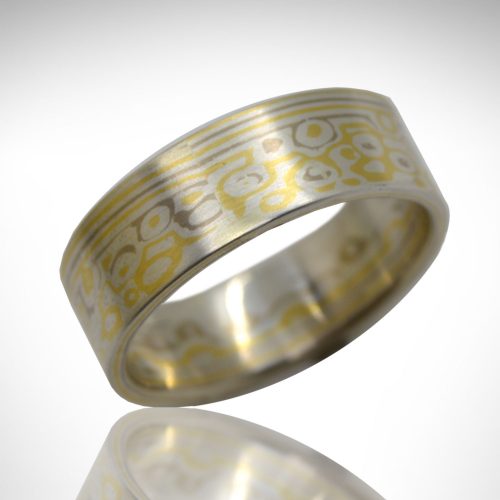 Mokume gane wedding band designed by Morgan's Treasure in 14K white gold, 18k yellow gold and sterling silver with wood grain pattern