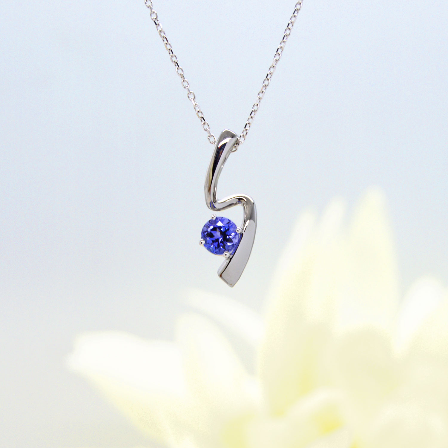 Tanzanite necklace in 14K white gold freeform pendant