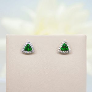 Tsavorite garnet stud earrings trillion shape with diamond halo