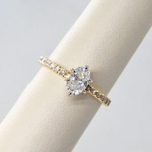 .74ct Oval natural diamond F/SI1 in accented solitaire band with 6 prongs