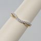 2- strand 14K yellow gold wedding band enhancer curved with row of prong set diamonds