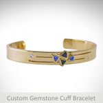 Custom designed cuff bracelet with gemstones in a geometric design by Morgan's Treasure