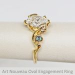 Custom designed engagement ring with oval diamond, vine branch design with linden tree leaves and alexandrite gemstones, Art Nouveau-Inspired, designed by Morgan's Treasure