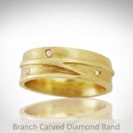 Mens carved yellow gold band with branch texture design with flush set diamond accents, custom made