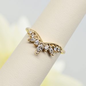 V shaped wedding band ring with round and marquise shaped natural diamonds in 14K yellow gold, designed by Morgan's Treasure