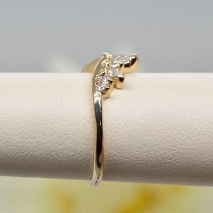 V shaped wedding band ring with round and marquise shaped natural diamonds in 14K yellow gold, designed by Morgan's Treasure