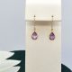 Dangle gemstone earrings in amethyst in 14K yellow gold with accent diamonds