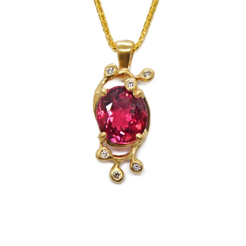 Red Tourmaline oval faceted gemstone in delicate leaf design with accent diamonds and a satin finish, designed by Morgan's Treasure