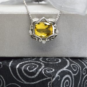 Cushion cut, 2.65 CT yellow beryl art deco filigree pendant with diamond accent on an 18" white gold chain