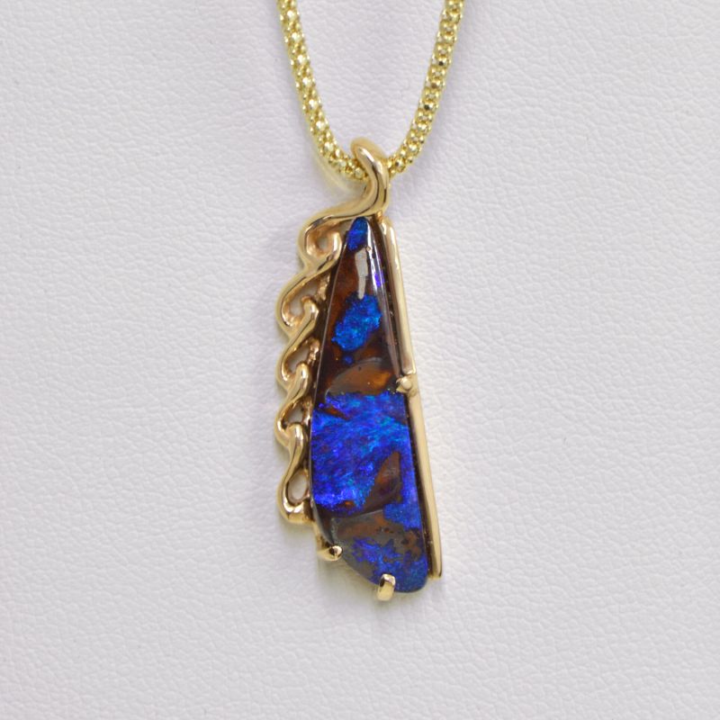 Australian boulder opal pendant custom jewelry with blue and brown gemstone and 14K yellow gold carved pendant made by Morgan's Treasure