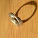Mokume gane wedding band with mobius twist in 3-tone tricolor metals with 18k yellow gold, 14k rose gold, sterling silver. Handmade by Morgan's Treasure Custom Jewelry
