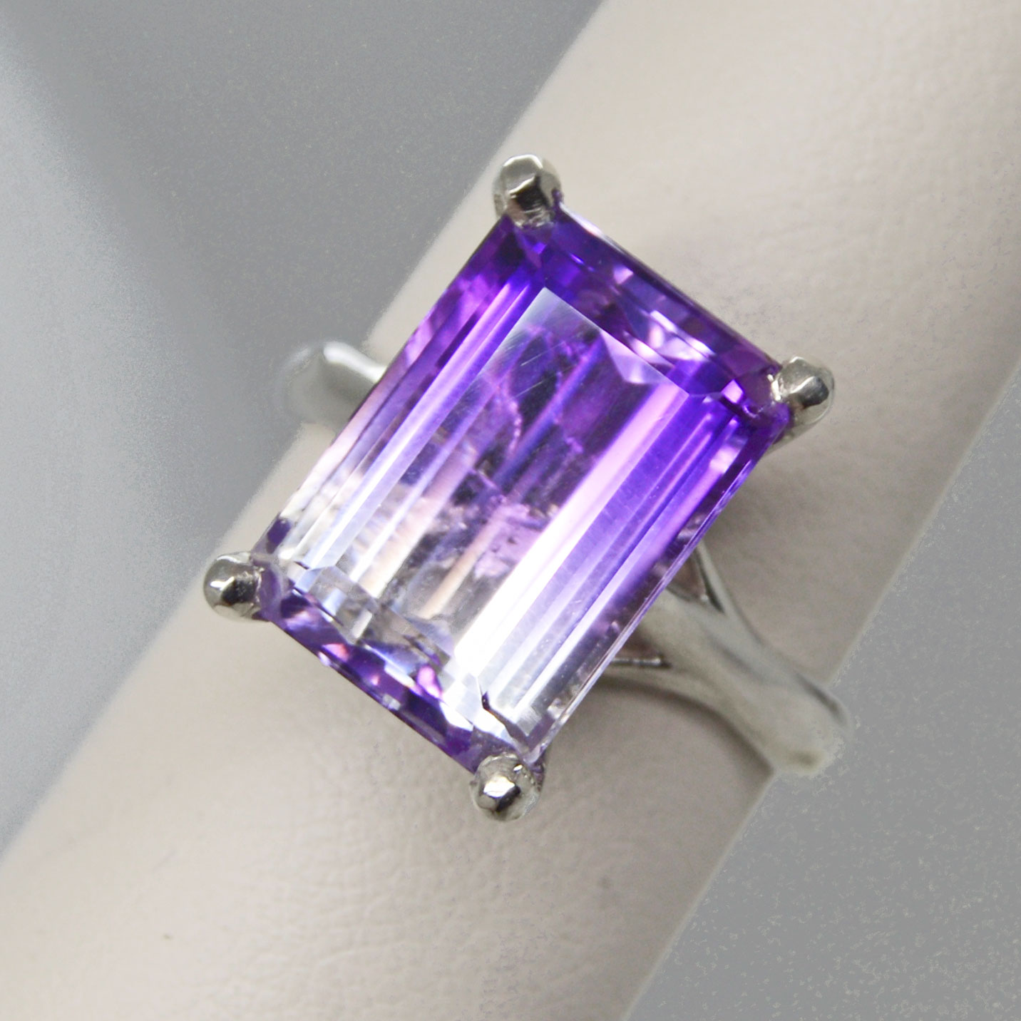 Bicolor purple/white large emerald-cut amethyst gemstone in 14K white gold ring statement modern cocktail unique right hand ring.