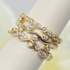 Example of stackable rings together- 14K yellow gold and diamonds