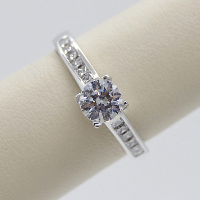 Solitaire Engagement Ring with Channel Set Diamonds in 14K White Gold