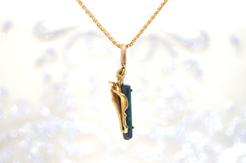 CALA LILY PENDANT WITH BLACK OPAL IN 14KT. YELLOW GOLD