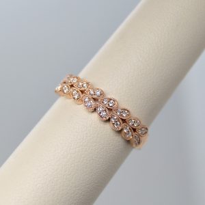14k rose gold wedding band or stackable ring with double row of diamonds in leaf shape with millgrain edge