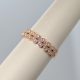 14k rose gold wedding band or stackable ring with double row of diamonds in leaf shape with millgrain edge