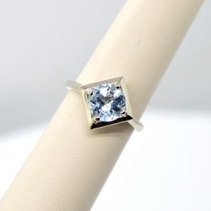 Aquamarine ring in 14K white gold in a geometric square setting