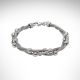 sterling silver bracelet with polished beads twisted into woven sterling wire.