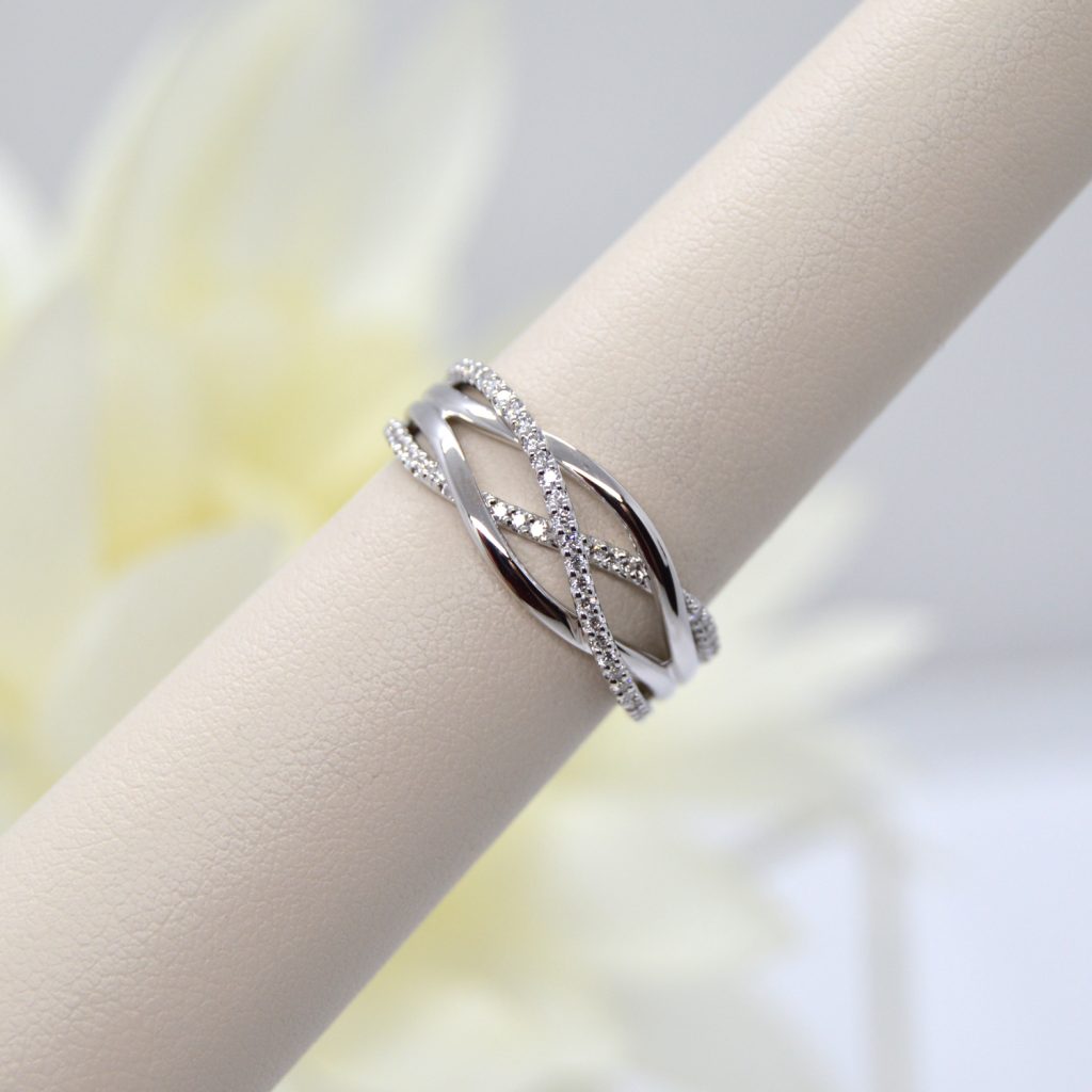 14K white gold criss cross organic freeform ring with diamonds designed by Allison Kaufman