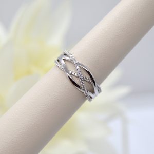 14K white gold criss cross organic freeform ring with diamonds designed by Allison Kaufman