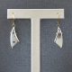 Druzy earrings in sterling silver with 14K yellow gold accents that dangle and move. Designed by Morgan's Treasure in Uptown Westerville