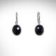 faceted onyx gemstones are bezel set as dangles from lever back earrings in 14k white gold