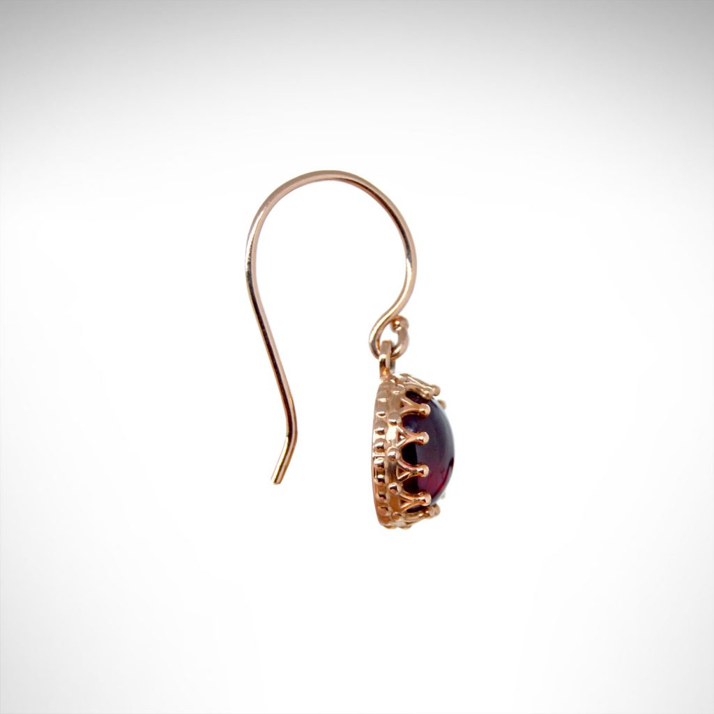 14K rose gold dangle earrings with crown style prongs set with cabochon rhodolite garnets