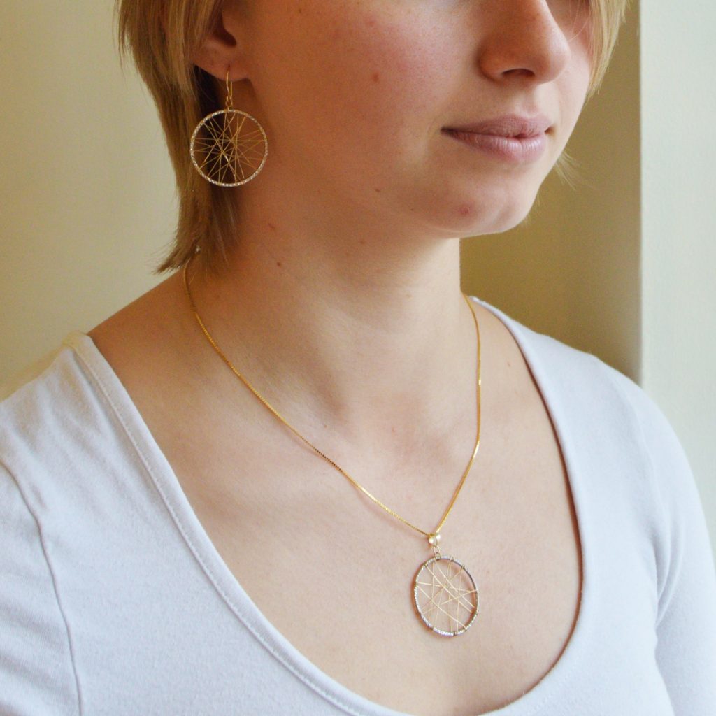 Dream catcher necklace in 14K white gold and 14k yellow gold, two-tone woven design with box chain.