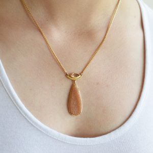 14k yellow gold necklace, gold jewelry with precious topaz bezel-set marquise and wheat chain with dangle of teardrop-shaped druzy with prongs and natural gemstone with quartz crystals on agate, natural color apricot/peach/tan