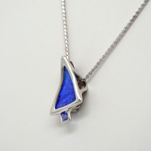 designed by Morgan's Treasure, boulder opal and tanzanite necklace in white gold, triangular and square