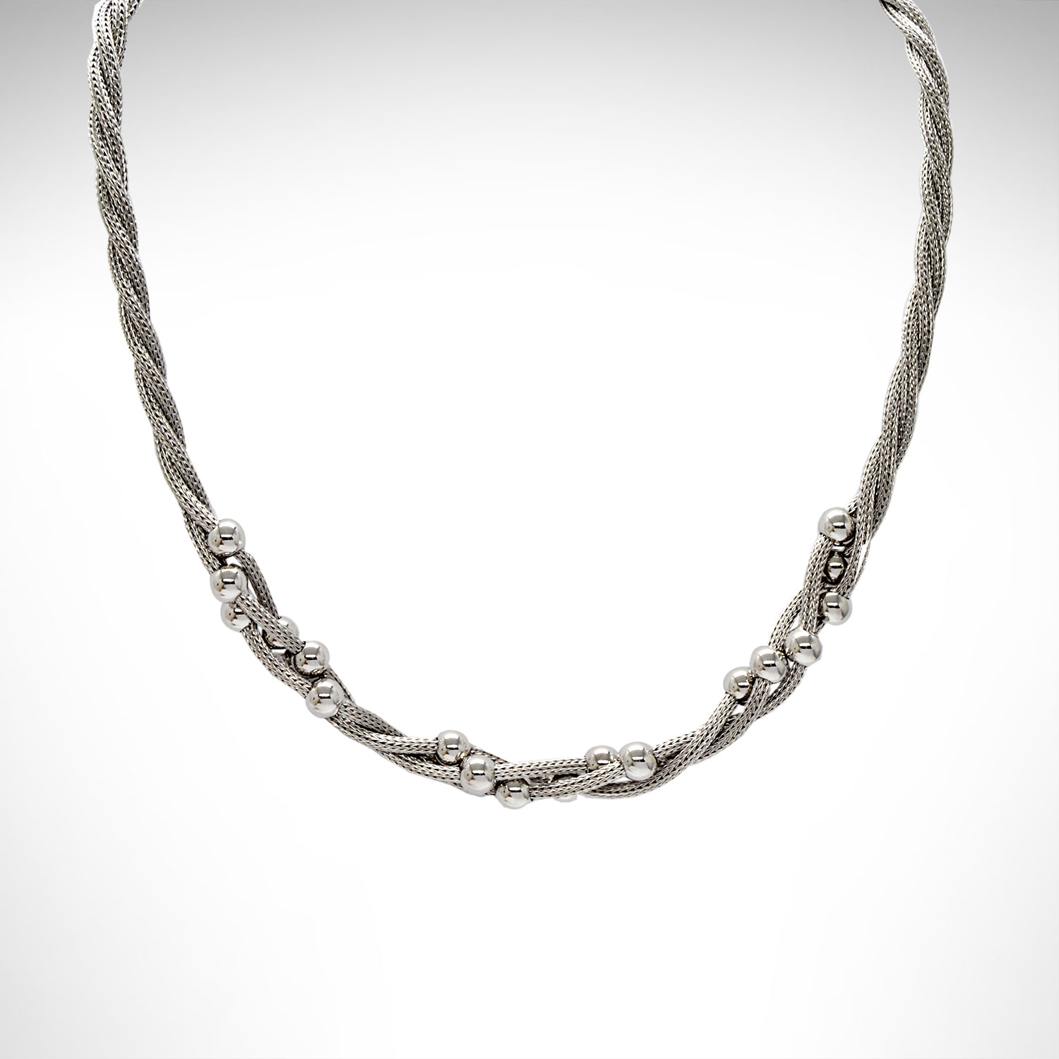 sterling silver necklace with polished beads twisted into woven sterling wire.
