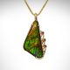 Ammolite gemstone in 14K yellow gold with orange sapphires designed by Morgan's Treasure