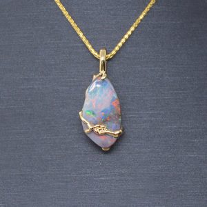 Dainty vine and flower design in 14k yellow gold pendant with beautiful Australian boulder opal natural gemstone. Designed by Morgan's Treasure in Westerville, OH