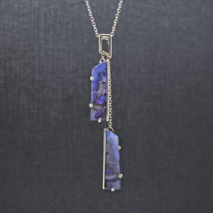 Lariat style necklace with pendant designed by Morgan's Treasure. 14K white gold two blue boulder opals on 26 inch chain