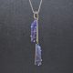 Lariat style necklace with pendant designed by Morgan's Treasure. 14K white gold two blue boulder opals on 26 inch chain