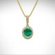 14ky gold emerald and diamond pendant with diamond halo and diamond bail on a yellow gold chain