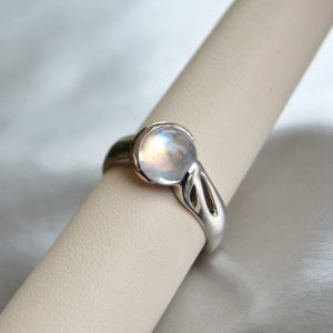 Designed by Morgan's Treasure, Rainbow Moonstone gemstone cabochon ring with crescent moon bezel, in white gold ring