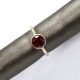Round mozambique garnet in bezel set 14k white gold ring