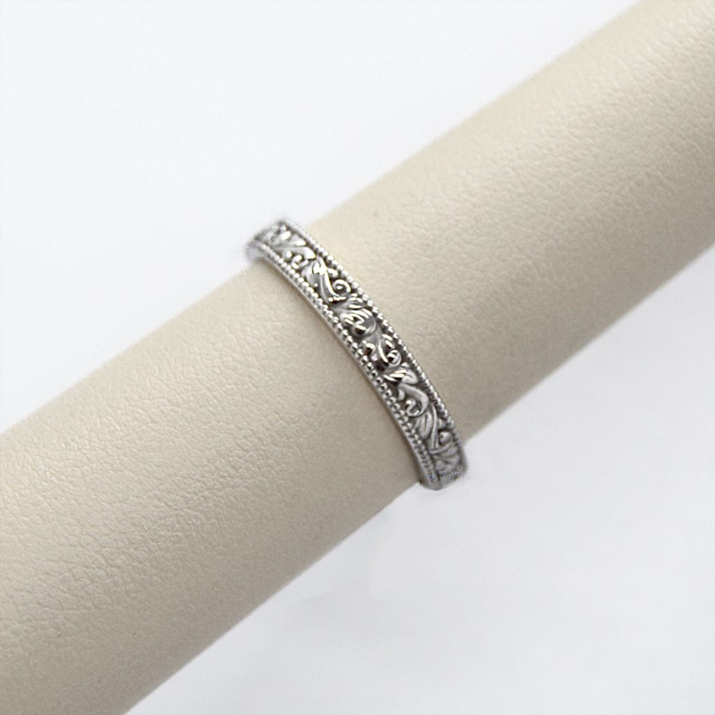 14k white gold band carved with vintage inspired design.
