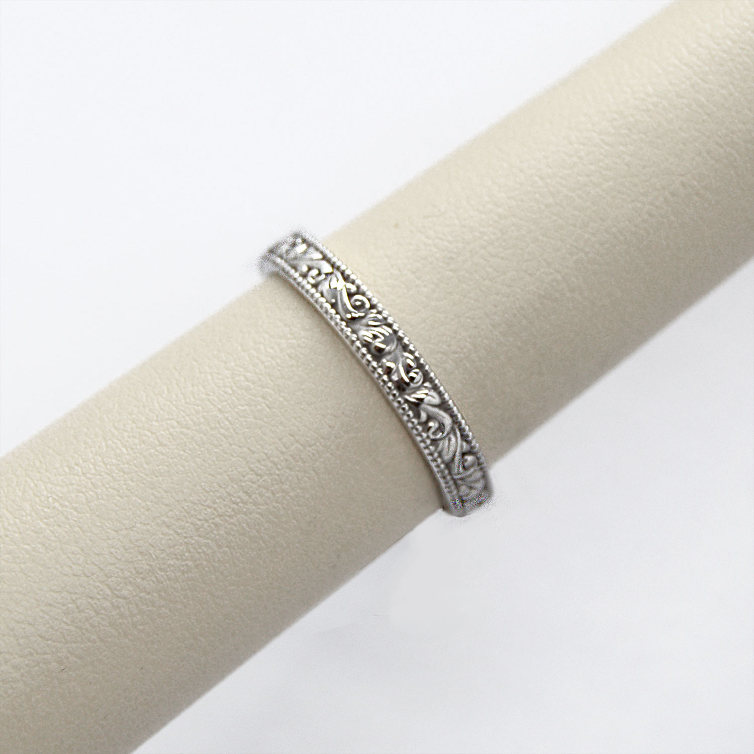 14k white gold band carved with vintage inspired design.